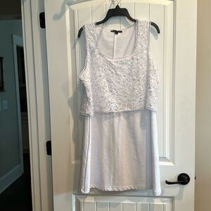 White sleeveless cotton dress.